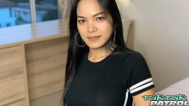 Thick Asian poses for camera inside room
