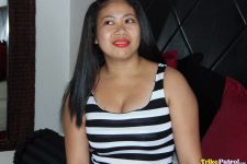 Filipina poses for camera with smile