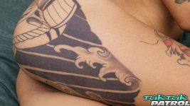 Nude Thai slut poses for camera with ass in focus