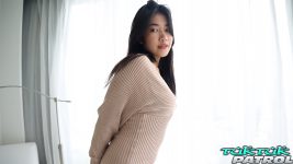Shy Thai babe poses for picture in hotel room