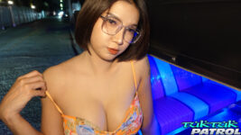 Pretty Thai nerd in tuktuk