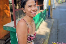 Petite Asian poses in the streets of Asia