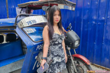 Filipina slut poses next to trike