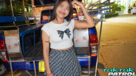 Pretty teen next to tuktuk