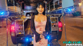 Thai babe sits on back of tuktuk