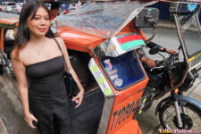Trike Patrol model poses next to trike