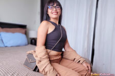 Filipina MILF poses on bed
