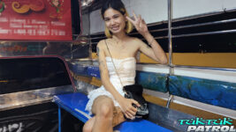 Thai teen poses inside Bangkok tuktuk
