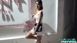 Pretty teen Thai poses for photo