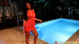 Thai hottie poses poolside